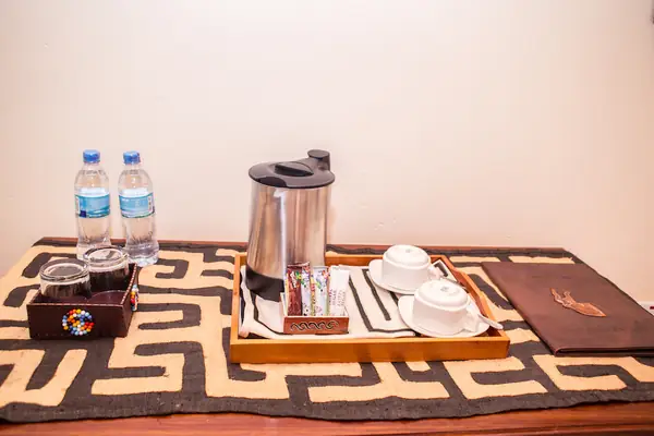 Tea and coffee station on a patterned runner